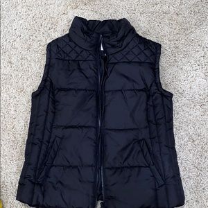 Selling a nice, never worn black puffy vest!